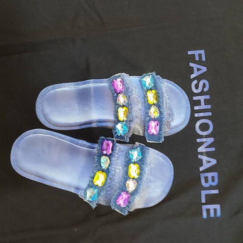 Black Graphic T-Shirt size M like new with sandal print and stones