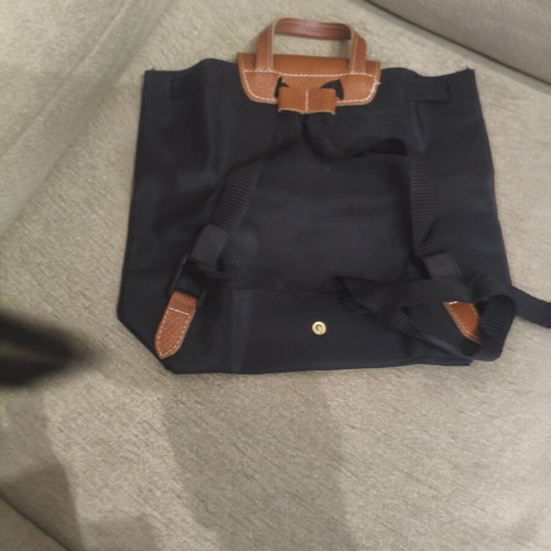 Foldable backpack like new, black with brown details