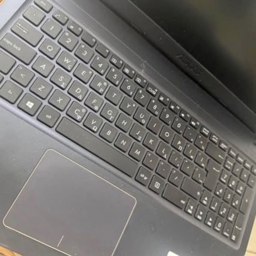 Asus laptop used, Intel Celeron, 8GB RAM, Windows 10