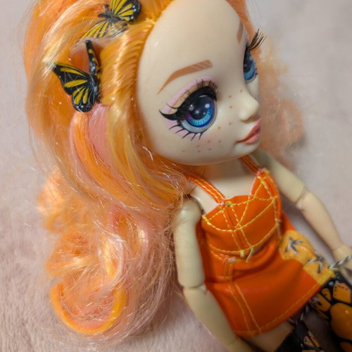 Rainbow High Poppy Rowan Fashion Doll with 2 Mix & Match Outfits, like new