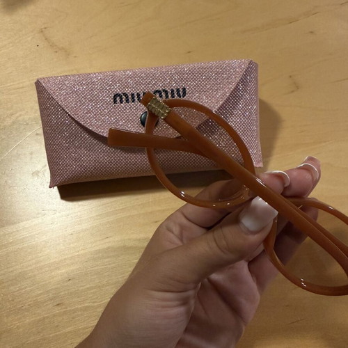 Miu Miu round orange sunglasses
