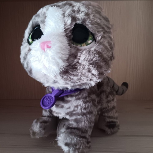 Plush feline doll used with sound