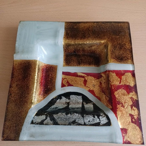 Decorative large ashtray like new with gold and silver leaf