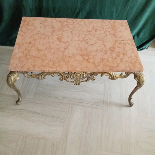Bronze coffee table used with pink marble