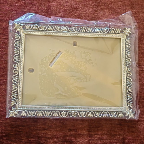 Vintage photo frame, new in original packaging