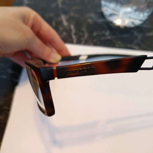Carrera eyeglass frame used, black with light brown