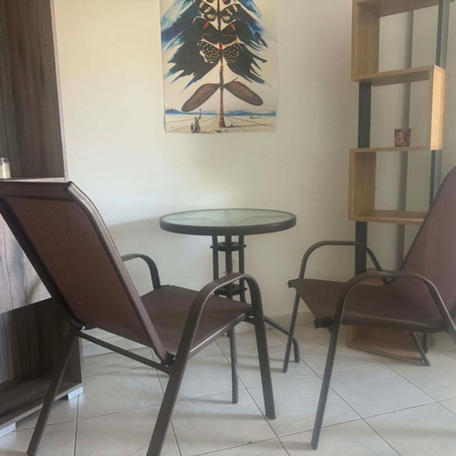 Furniture set used with metal chairs, table, and bookshelves