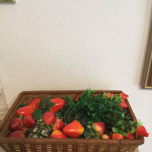 Basket with artificial fruits like new