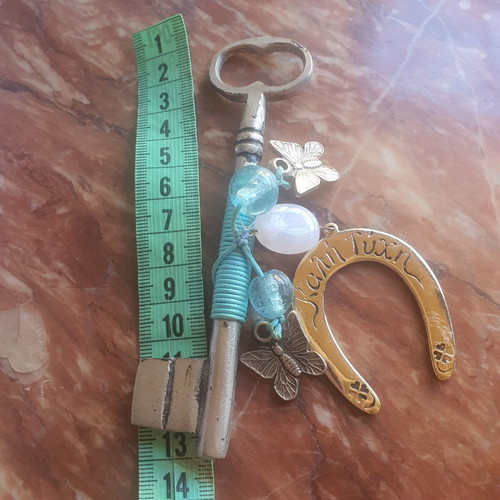 Lucky key charm with horseshoe