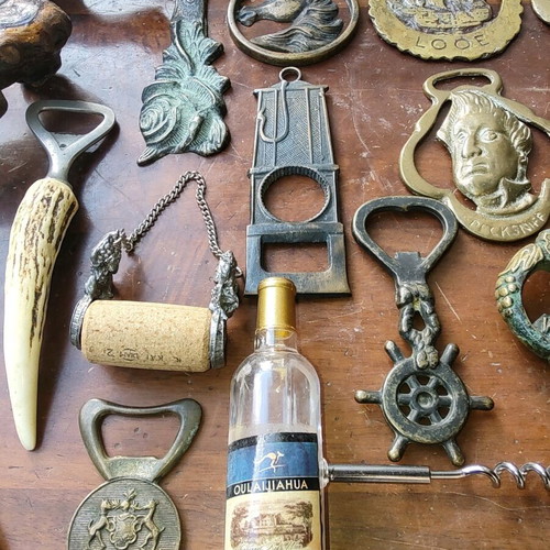 Collection of 21 bottle openers like new