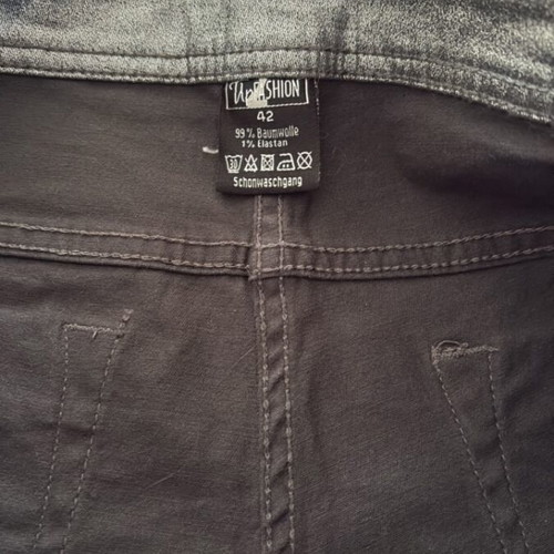 Slim jeans-style pants in silver metallic shade like new, size 42