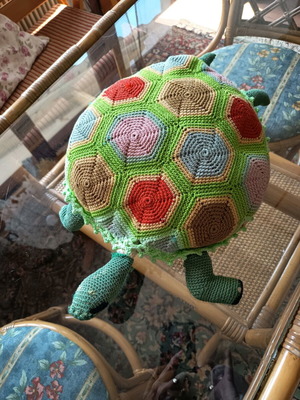 Knitted turtle pillow used, handmade decorative