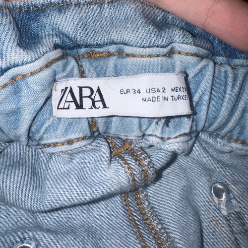 Zara jeans for women size 34 used, light blue wash, stretchy waist