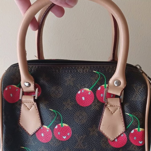 Handbag with cherries like new, brown and red