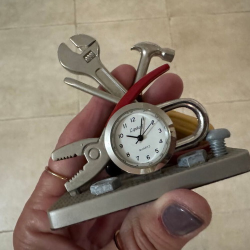Decorative tabletop clock like new with tools theme