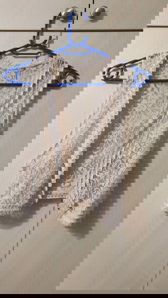 Γιλέκο χρώματος light pink.