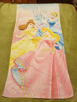 Disney children's beach towel used with wear and tear and tear