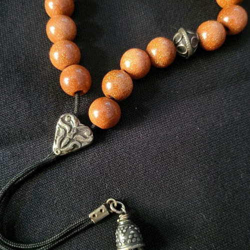 Komboloi made of goldstone and 925 silver like new