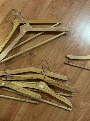 Wooden hangers used, set of 7, including one child size