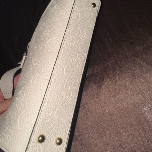 Guess white shoulder bag used with embossed logo pattern