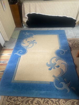 Embossed rug used, blue and beige, 1.97x1.40 m