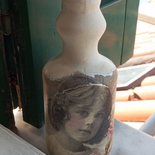 Handcrafted decorative bottle decoupage vintage style