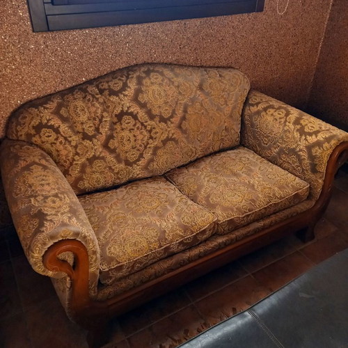 Set of two used velvet two-seater sofas made of solid mahogany