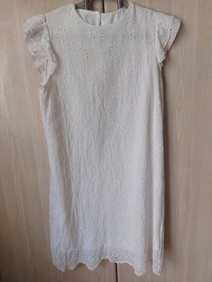 White dress with perforated design new, unworn size L