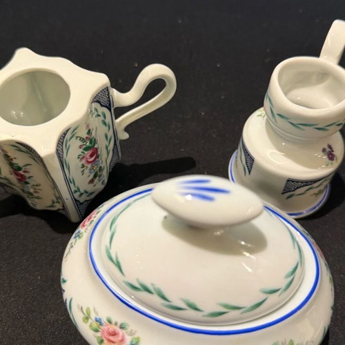 Limoges porcelain miniatures set like new, handpainted floral design