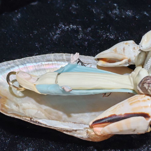 Handmade Virgin Mary statue with natural seashells