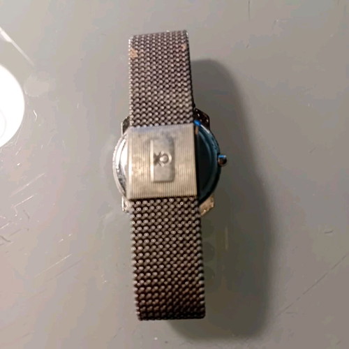 Beneton by Bulova watch used unisex with world map dial and metal mesh bracelet vintage collectible 1980-1990