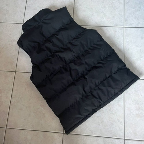 Black sleeveless vest, size XS