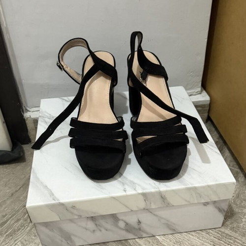 Black sandals used, 10 cm heel, size 37