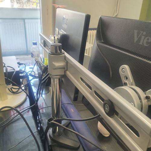 Dual monitor stand used, stable and practical arm