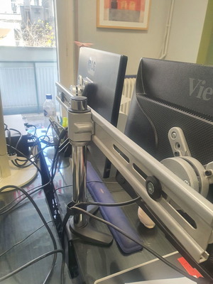 Dual monitor stand used, stable and practical arm