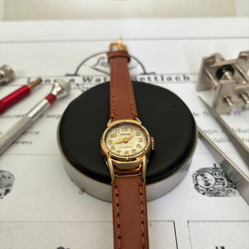 Jupiter women's watch used 1950s with leather strap gold tone