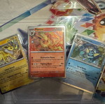 Pokémon Prismatic Evolutions promo cards and poster new