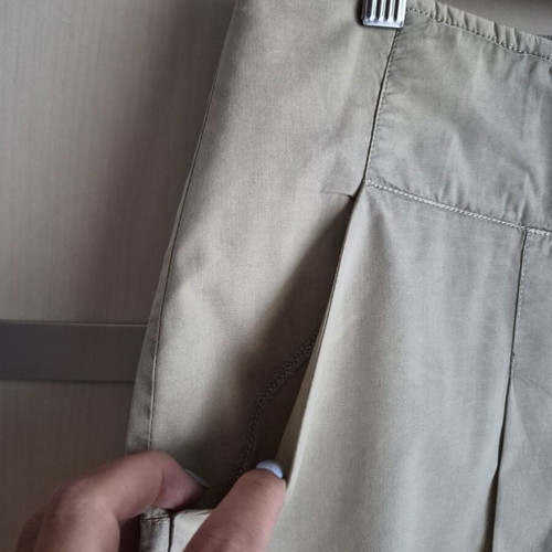 Mini skirt beige with pleats used, size M