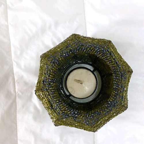 Decorative candle holder with beads like new, olive tones