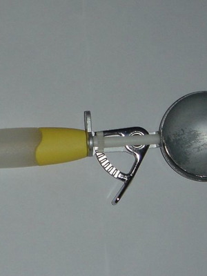 Professional ice cream scoop used, stainless steel with practical handle