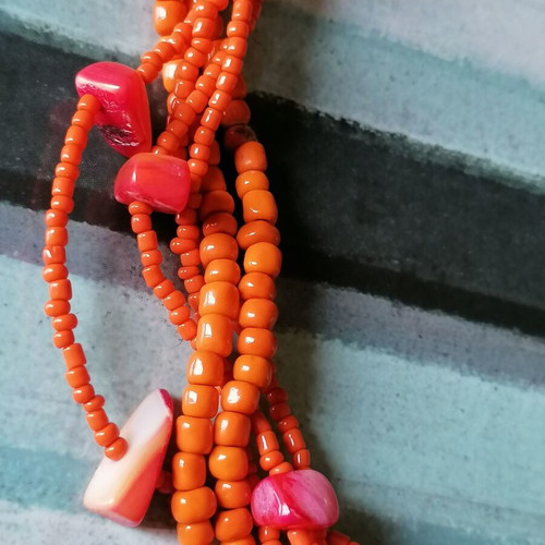 Necklace new with orange shell and beads