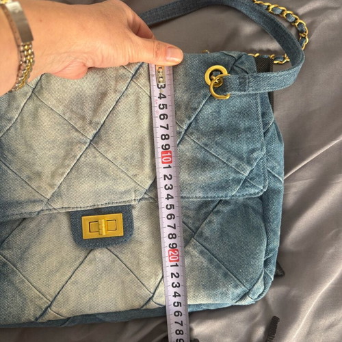 Denim shoulder bag like new with bronze details