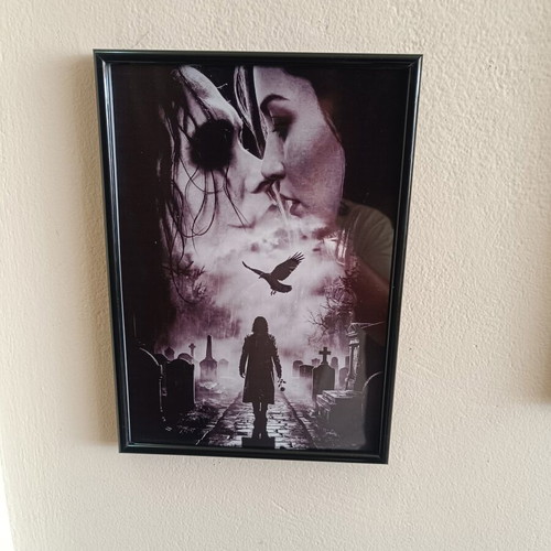 The Crow Decorative Frame like new with gothic style and black border