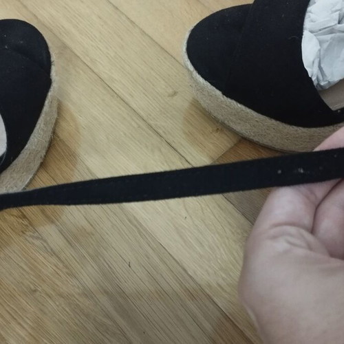 Black platform shoes used with strap wear, size 39