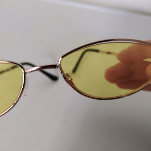 Sunglasses used with yellow lens and lightweight frame