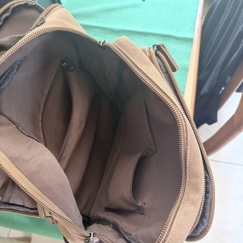 Backpack with reinforced durability, 16" capacity, multiple compartments