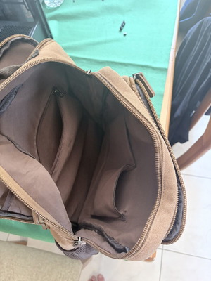Backpack with reinforced durability, 16" capacity, multiple compartments