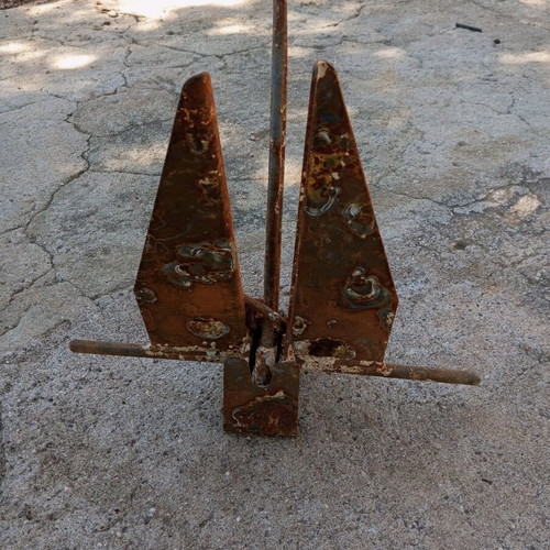 Anchor used for small boat, old and rusty