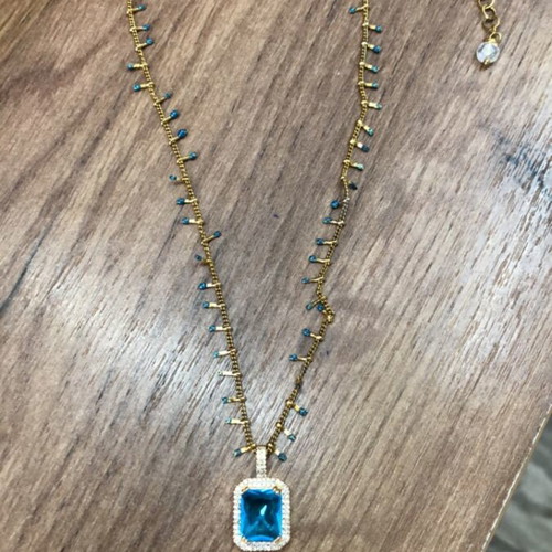 Necklace new with unique chain design and blue stone
