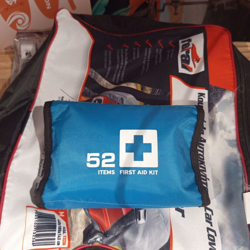 Jump cables, cross wrench, triangle and first aid kit like new